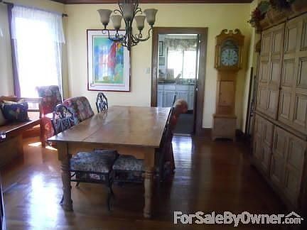 Formal Living Room
						:
						Hardwoods, FP/Pellet Stove,Crown Molding, 
Built-ins, Ceiling Fan, 23.9 x 12.10