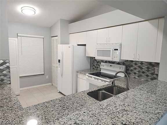 2nd image of 9660 Victoria Ln #A-301