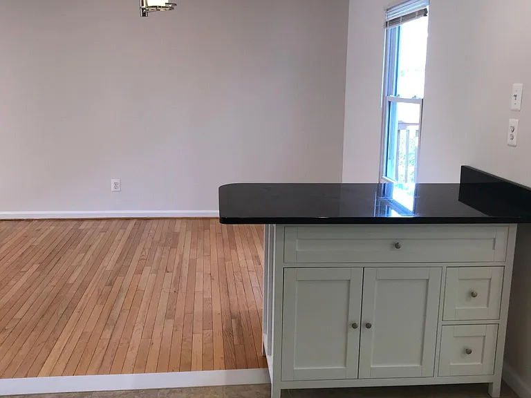 Island between Kitchen and Dinning Room.