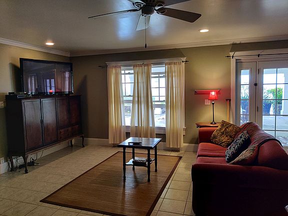Interior view to lanai and ocean from main living area.