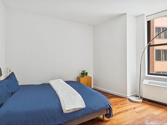 5th image of 1 Wall Street Ct APT 404