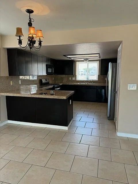 Building Photo - 9856 S Kingman Dr
