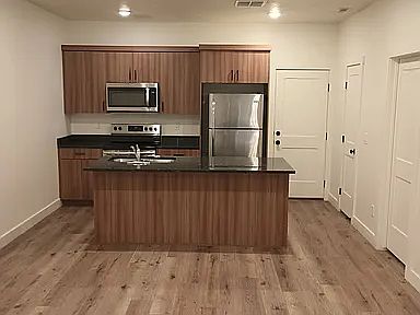 2nd image of 220 N Spring Creek Pkwy Unit 1