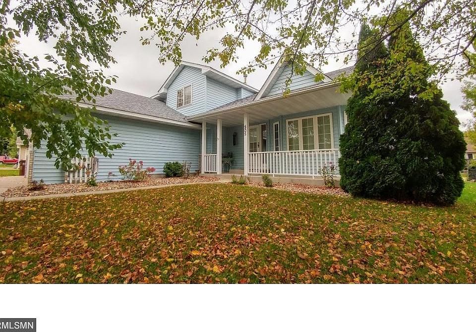 Inviting home with front porch and mature trees