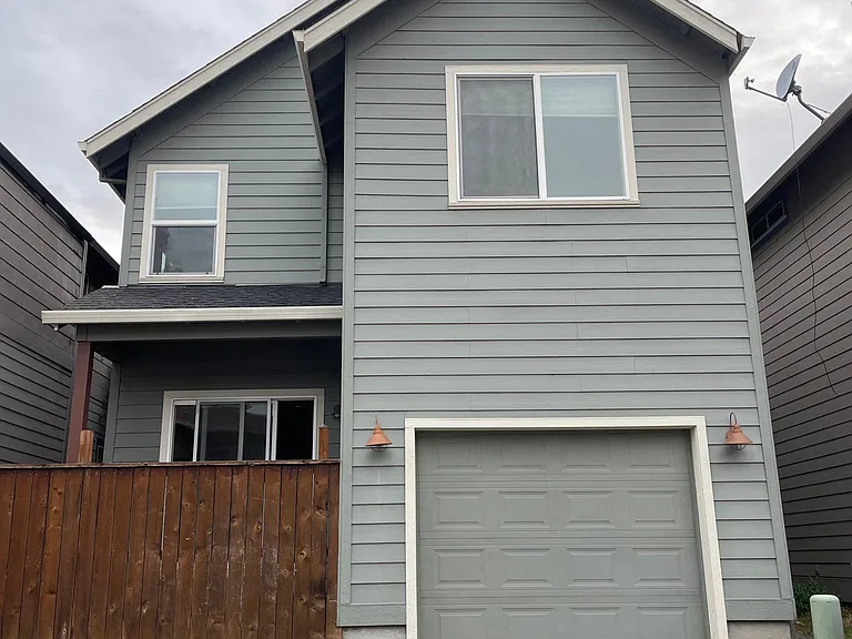 Alley view with garage door