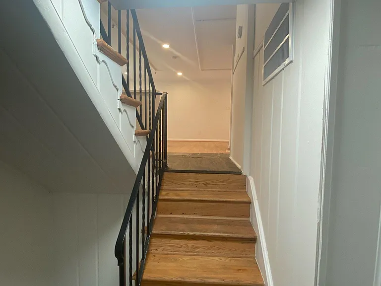 Stairs lead to lower level