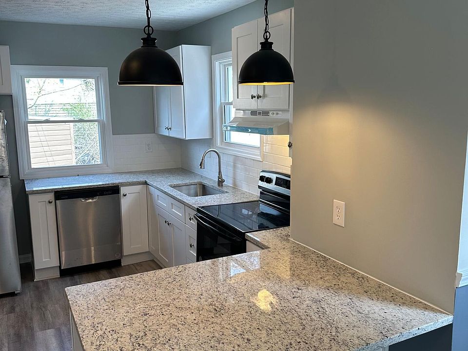 Lots of counterspace in the kitchen, including breakfast bar