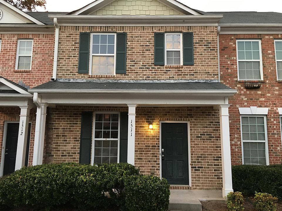 2 bedroom, 2.5 bath luxury townhouse has rocking-chair covered entry.