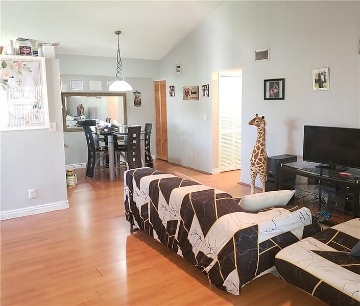 1st image of 709 Gardens Dr APT 204