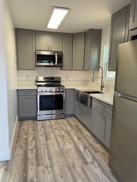 Beautiful New Galley Kitchen all New Stainless Steal Appliances
