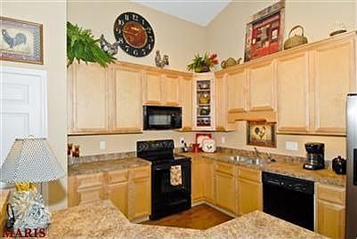 Updated kitchen with birch flooring