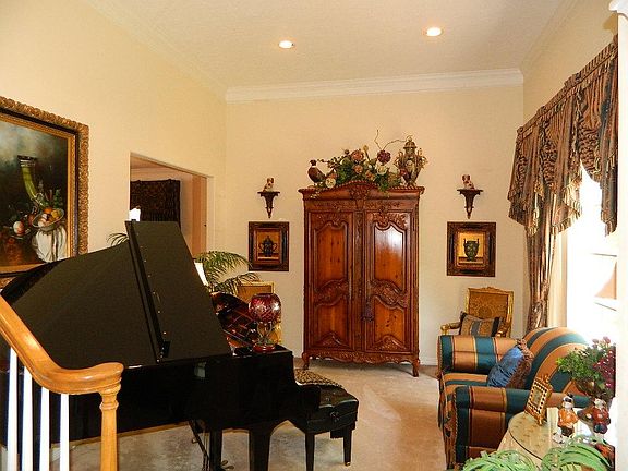 Whether you have a Baby Grand Piano, or not, this formal living room is an inviting room for your gu
