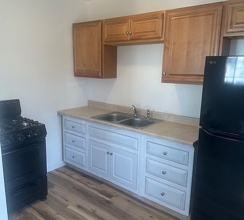 Nicely remodeled kitchen with brand new stove and refrigerator included.