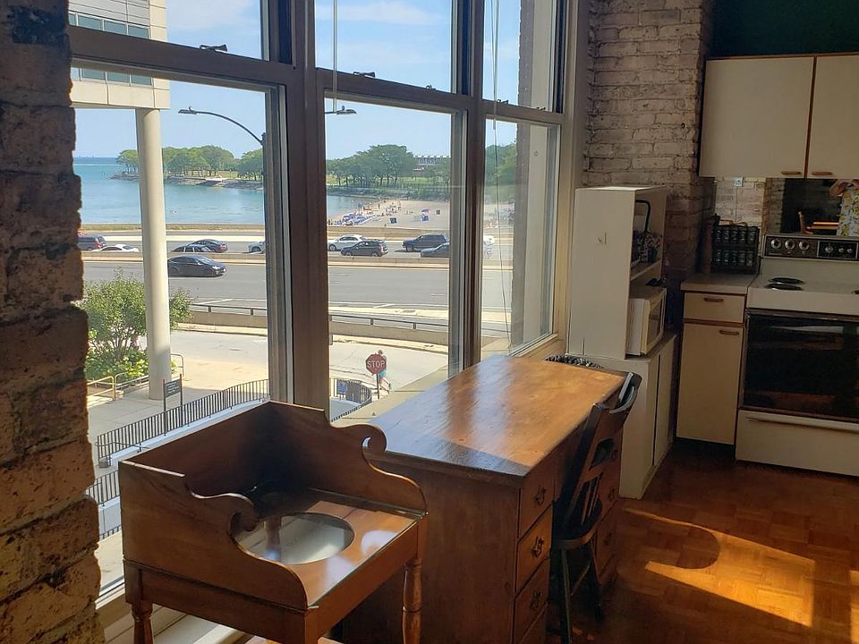 Overlooking Ohio Street Beach, the condo has wonderful light facing NE.