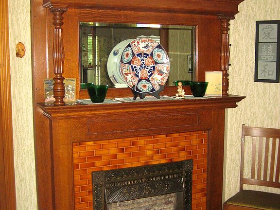 Oak mantle with tile surround