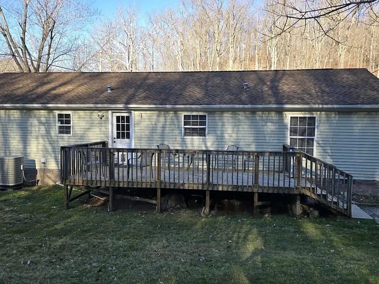 Back of home w/deck