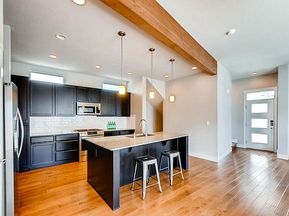 5th image of 8783 E 55th Ave