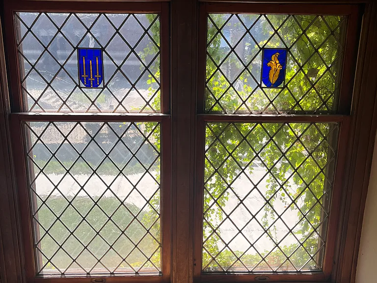 Huge leaded and stained glass windows on the landing