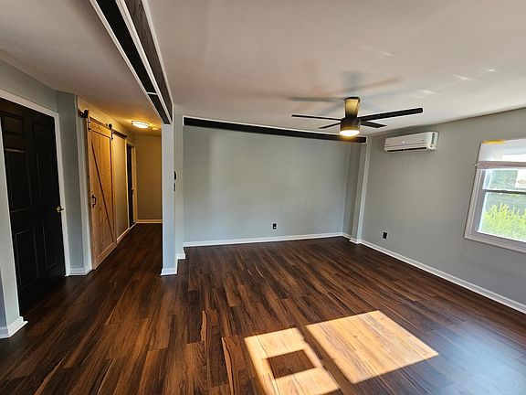 Living Room/Dining Room Open Concept to Kitchen. Dimmable Ceiling Light Fan.