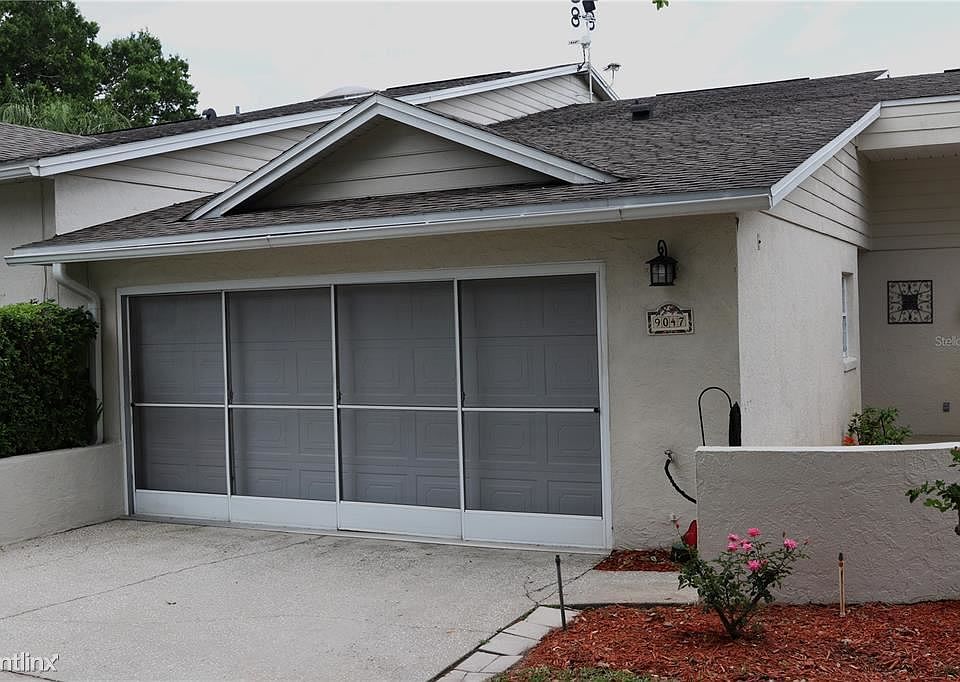 1st image of 9047 Village Green Blvd