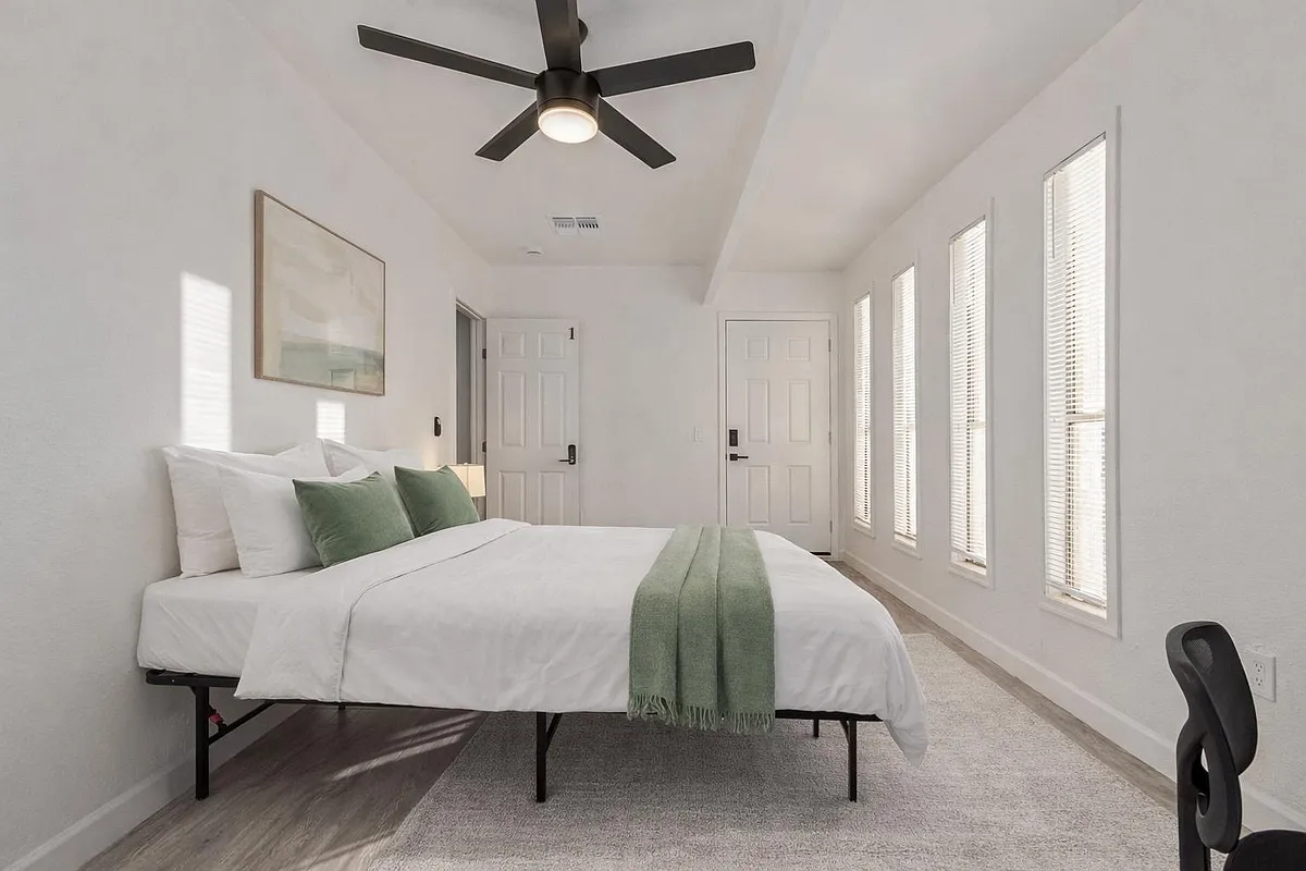 Photo 1 of 10 - W 2nd Pl - Mesa, AZ Spacious Bedroom with excellent lighting and private entrance. Bedding and rug virtually staged. - W 2nd Pl