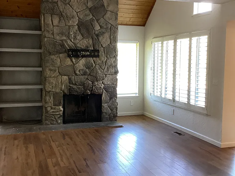 Built in bookcase and fireplace