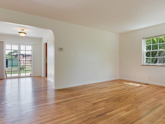 View as you enter the home. Nice original hardwood floors!