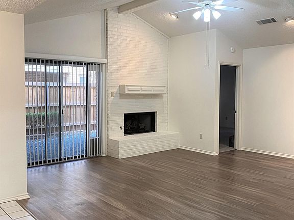 Great Living space with a Vaulted Ceiling and Gas Fireplace opening to the 2nd Private Patio area