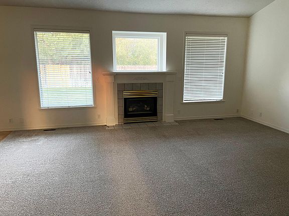Large living room with gas fireplace