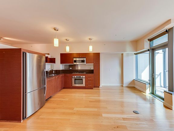You could live in this kitchen and eat looking out onto the balcony.