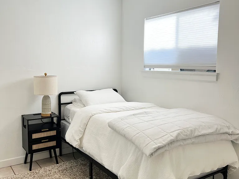 Small Bedroom (has closet and built in drawers)