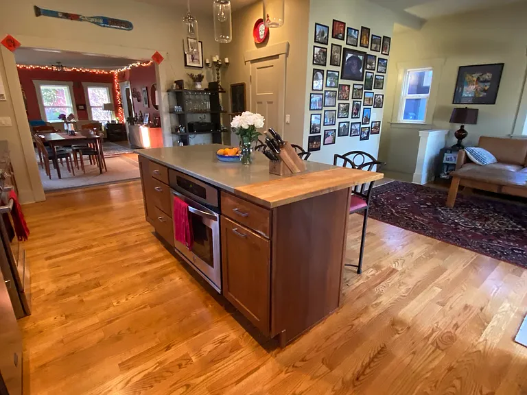 View of island / couch seating area in kitchen