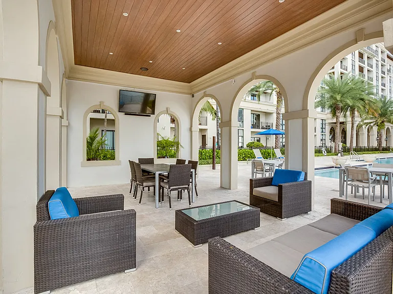 BBQ area and gazebo, with lake and pool views