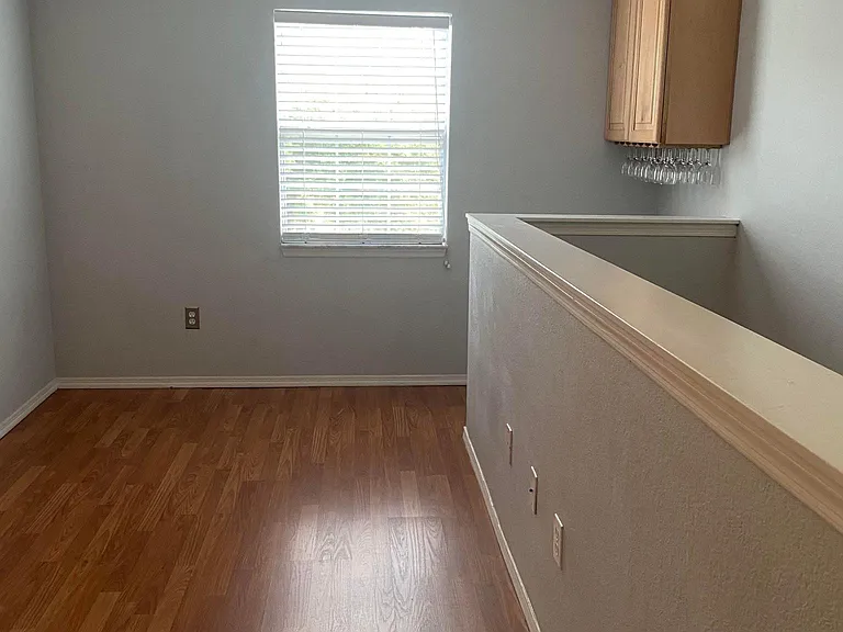 Family Room - WIne Cabinet and Laminate flooring