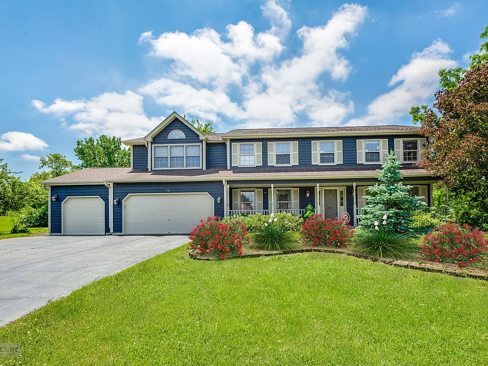 Great curb appeal on an amazing lot!  The Large lot is over an acre!  Lots of space in the 3 car gar