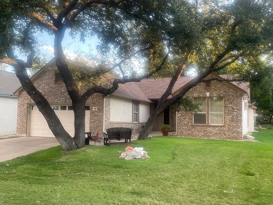 There always seems to be a hefty breeze across the front of this home. Sitting out front on the benches under the trees is a real treat any time of year