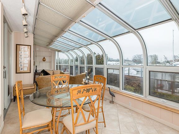 Sunroom, overlooking water and dock - Second View