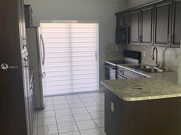 5th image of 7845 W 36th Ave Unit 202