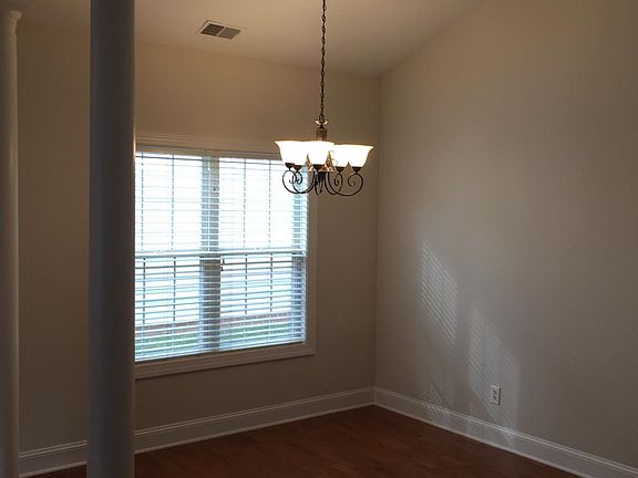 Dining room with cathedral ceiling