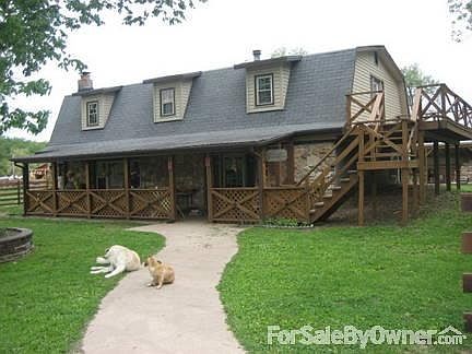 Ranch house
						:
						Ranch house, decks, and front porch