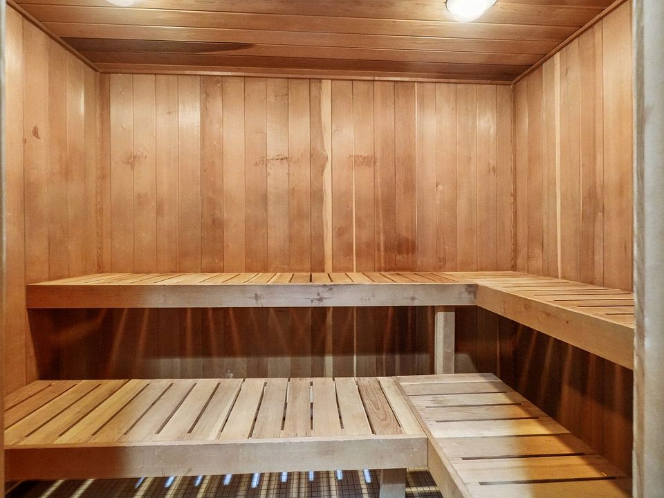 Dry sauna in fitness and wellness center at Drawbridge Apartments in Harrison Township, MI.
