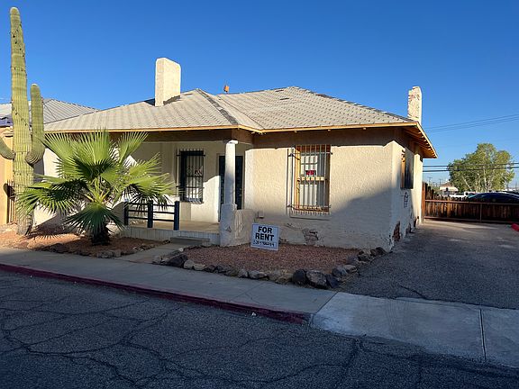 Historic Office in El Presidio Barrio, with two parking spaces in driveway, plus parking available in adjacent lot and on street front.