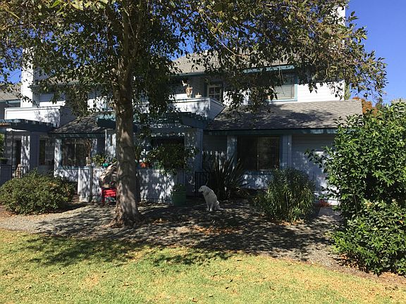 Condo backs up to park, which is accessible via first floor patio.