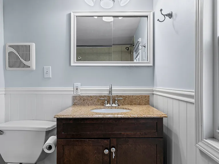 Bathroom with granite counter top