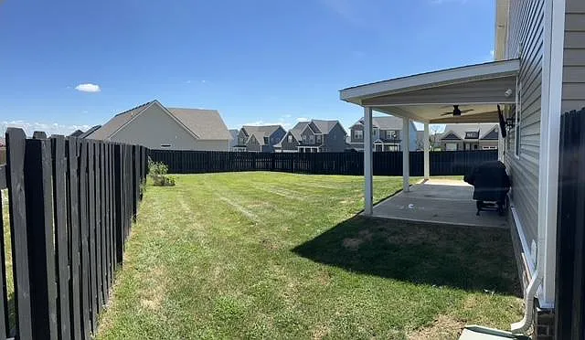 Huge back yard with raised garden!