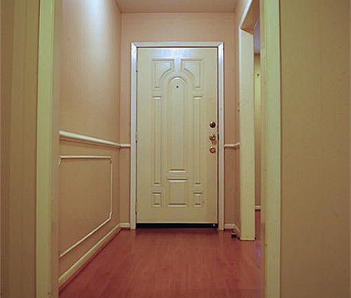 Grand foyer with picture frame wall detailing