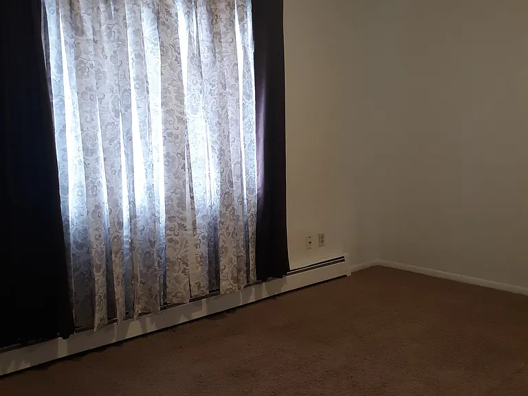 Master bedroom with large windows