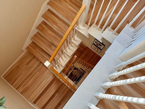 Staircase view from the 3rd floor looking down to 1st floor