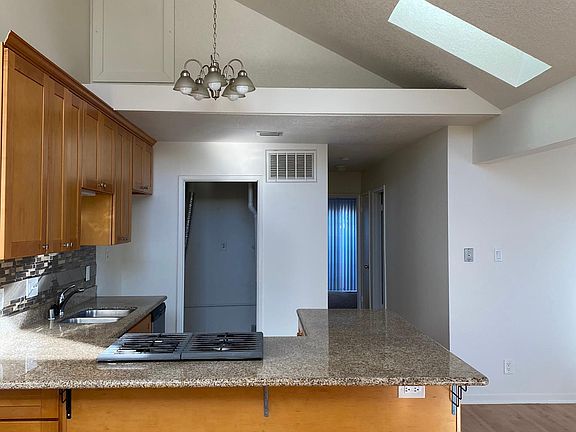 Bright skylights throughout.