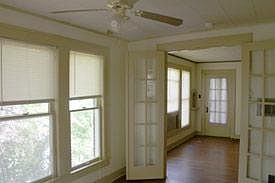 Dining room with French doors looking into the living room